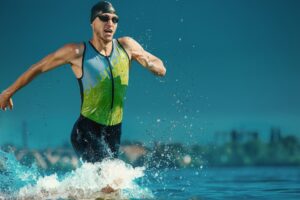 Professional triathlete swimming in river's open water