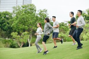 Sportsmen running in park