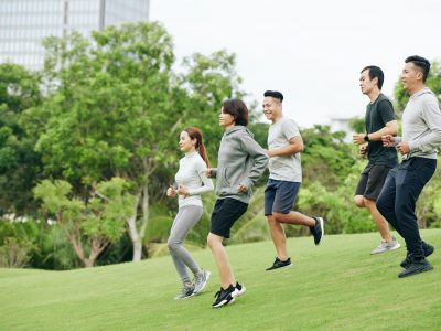 Sportsmen running in park